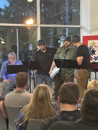 The Narrator, a corpsman, Al Tharp, and Pauly Roth in Songs From the Home Front.